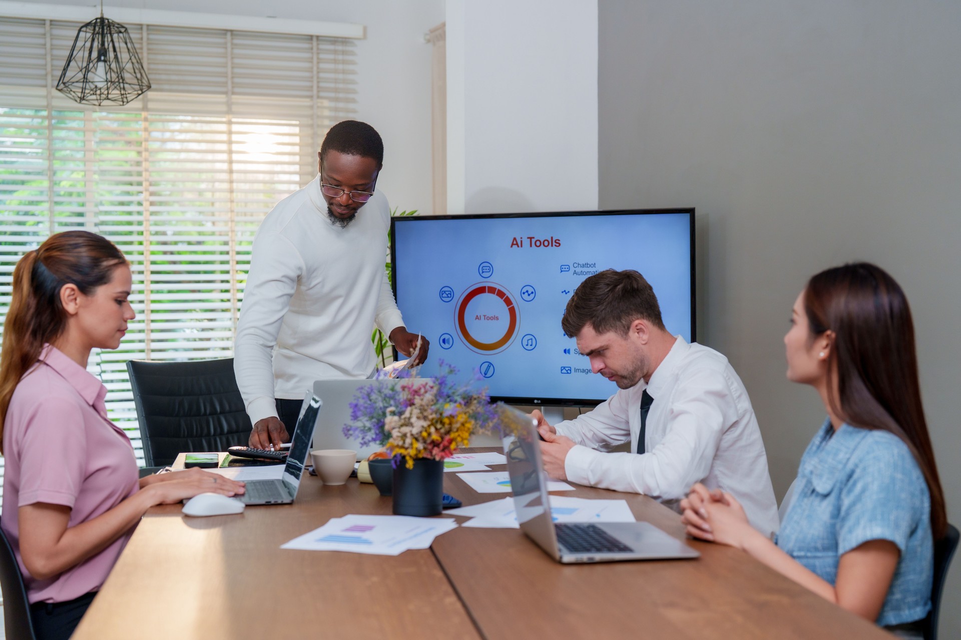 In modern business setting, team collaborates on technology and marketing strategies, utilizing AI tools for analysis and innovation. atmosphere is focused and productive